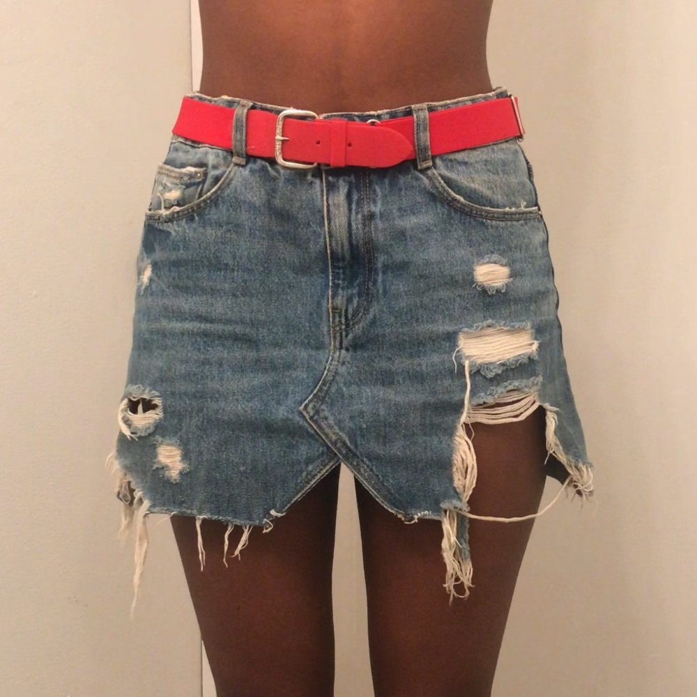 Extremely distressed denim skirt